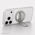 Silver METALINIST magnetic phone ring holder used as a landscape phone stand