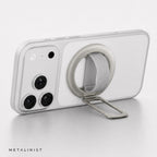 Silver METALINIST magnetic phone ring holder used as a landscape phone stand